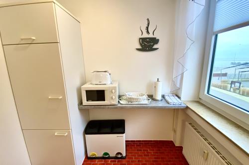 Borkum Ferienwohnung Meerblick Appartement "Schöne Aussichten" - Küche mit Aussicht