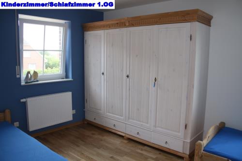 Borkum Ferienhaus Dat Rosenhuus - Kinderzimmer/Schlafzimmer I im ersten OG