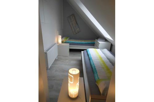 Borkum Ferienwohnung FeWo Borkum 16 - Zimmer neben Ess-/Wohnzimmer