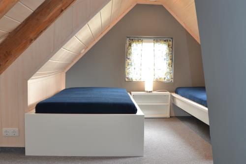 Borkum Ferienwohnung FeWo Borkum 16 - Spitzboden mit zwei Tagesbetten