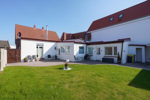 Borkum Ferienwohnung Ferienappartements Süderstraße - Garten hinter dem Haus für alle Wohneinh