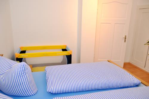 Borkum Ferienwohnung Ferienappartements Süderstraße - Appartement 100 - Schlafzimmer 1 mit Babybett möglich