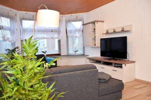 Borkum Ferienwohnung Ferienappartements Süderstraße - Appartement 100 - Wohnzimmer