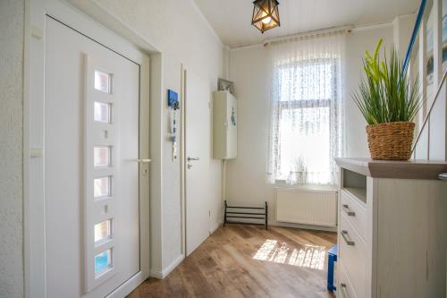 Borkum Ferienhaus Daheim - Wuldegapstraße 11 Flur4