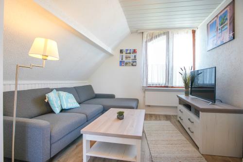 Borkum Ferienhaus Daheim - Wuldegapstraße 11 Wohnzimmer 1OG 1