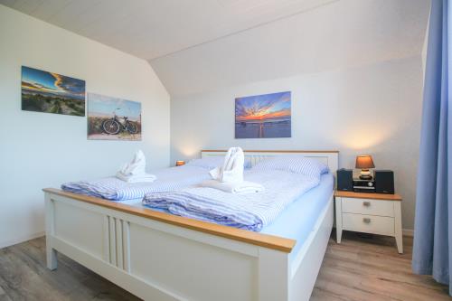Borkum Ferienhaus Daheim - Wuldegapstraße 11 Schlafzimmer 2 1OG 3