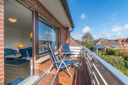 Borkum Ferienwohnung Ferienhaus Kiebitzdelle - 4 - Balkon - Ausstattung 4