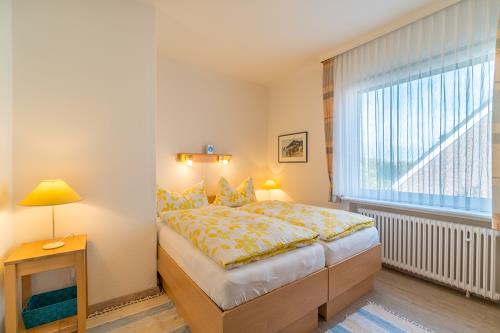 Borkum Ferienwohnung Ferienhaus Kiebitzdelle - 4 - Balkon - Ausstattung 6