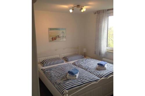 Borkum Ferienhaus Starlight - Schlafzimmer 1