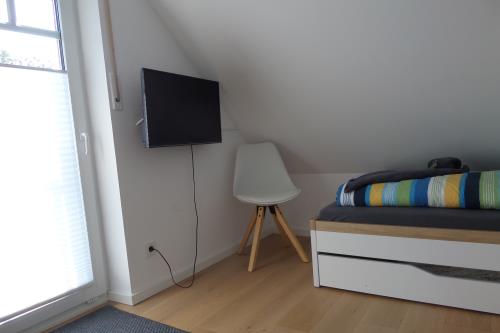 Borkum Trientjes Ferienhaus - Trientjes FH - ID 12033 - Schlafzimmer 3 mit Bett + Ausziehcouch