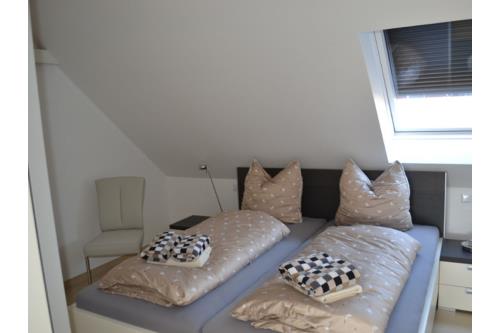 Borkum Ferienwohnung Borkum Lounge - schlafzimmer mit doppelbett