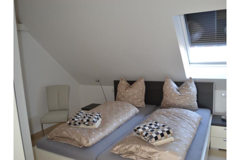 Borkum Ferienwohnung Borkum Lounge - schlafzimmer mit doppelbett