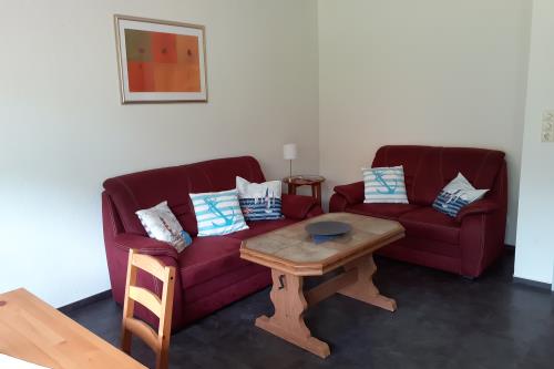 Borkum Ferienwohnung Deichterrasse - Gemütliche Sitzgruppe im Wohnzimmer