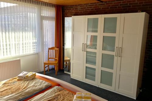 Borkum Ferienwohnung Haus Rügen - Schlafzimmer
