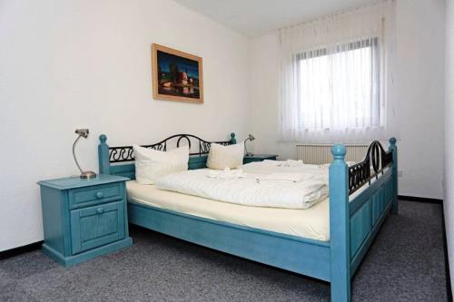 Borkum Ferienwohnung Kiewitt - Schlafzimmer