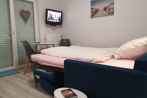 Borkum Ferienwohnung Kleines Kaap - elektrische Jalousien