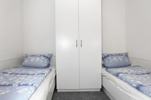 Borkum Ferienwohnung Meerblick, Wohnung 4 - Schlafzimmer