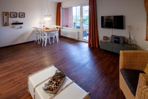 Borkum Ferienwohnung Meerzeit - Wohnzimmer mit Essecke