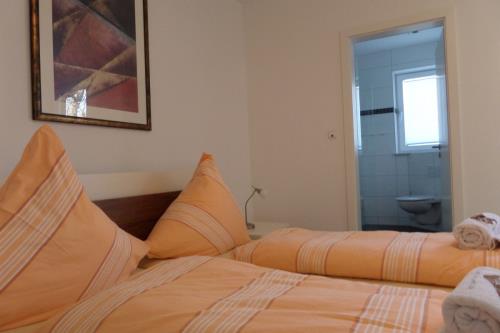 Borkum Ferienwohnung Moosdünen - Schlafzimmer mit Bad