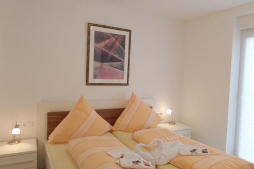 Borkum Ferienwohnung Moosdünen - Schlafzimmer mit Doppelbett