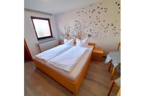 Borkum Ferienwohnung Haus Ostermann - Schlafzimmer