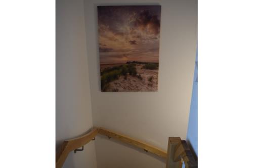 Borkum Ferienwohnung Peters Hus EG Nr. 51 vorne - treppenhaus ins soutarain