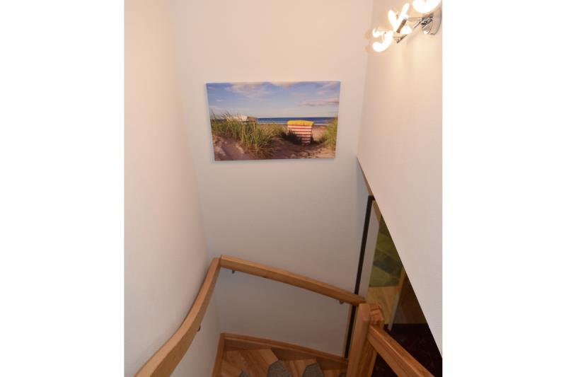 Borkum Ferienwohnung Peters Hus EG Nr. 51 vorne - treppenhaus blick ins soutarain