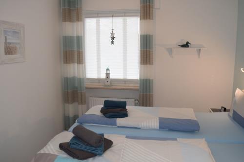 Borkum Ferienwohnung Peters Hus EG Nr. 51 vorne - schlafzimmer im erdgeschoss