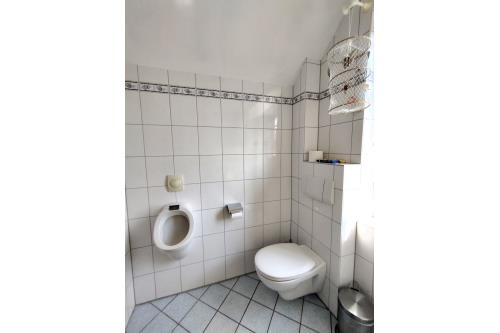 Borkum Ferienwohnung Seestern - Gästetoilette WC 2025