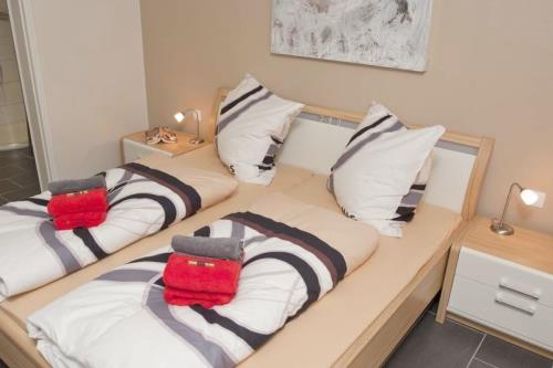 Borkum Ferienwohnung Strandkoje - gemütliches doppelbett im schlafzimmer