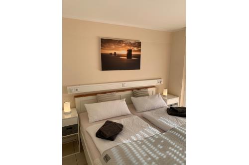 Borkum Ferienwohnung Südperle - gemütliches SZ mit Doppelbett