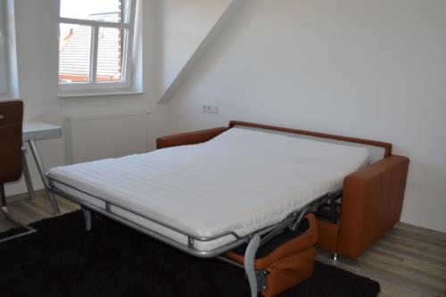 Borkum Ferienwohnung Wellenklang - klappbares sofa