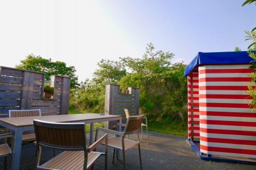 Borkum Ferienwohnungen Riegenhagen - Sonnenterrasse mit Strandzelt