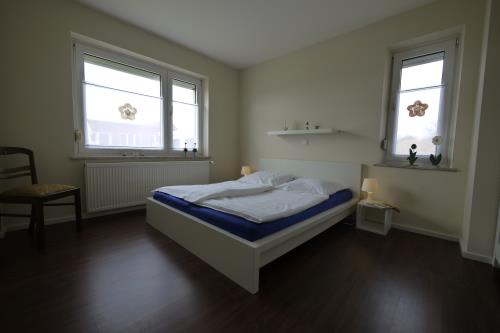 Borkum Ferienwohnungen Riegenhagen - EG - Schlafzimmer 1