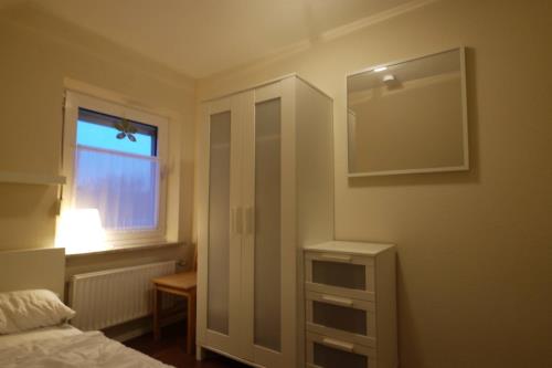 Borkum Ferienwohnungen Riegenhagen - OG - Schlafzimmer 1