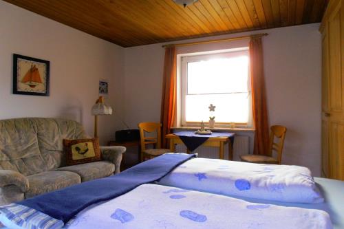 Borkum Ferienwohnungen Weiß - Herzmuschel - Wohn-Schlafraum 