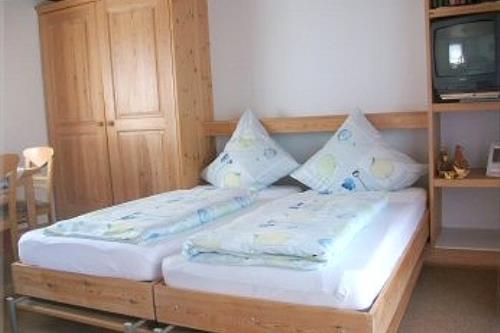 Borkum Ferienwohnungen Weiß - Herzmuschel -  Wohn-Schlafraum