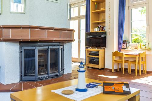 Borkum Ferienwohnung Jantje / Haus Leuchtturmkieker - Kamin für lange Winterabende