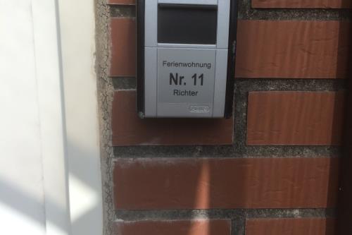 Borkum Haus Norderoog Ferienwohnungen Hindenburgstraße 56 - Nr.11 - Terr. + PKW-Stellplatz - Whg.11 - Eingangsbereich - Schlüsselsave