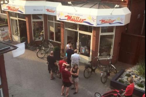 Borkum Haus Norderoog Ferienwohnungen Hindenburgstraße 56 - Nr.8 - Balkon + PKW-Stellplatz - Bäckerei und Konditorei - Müller