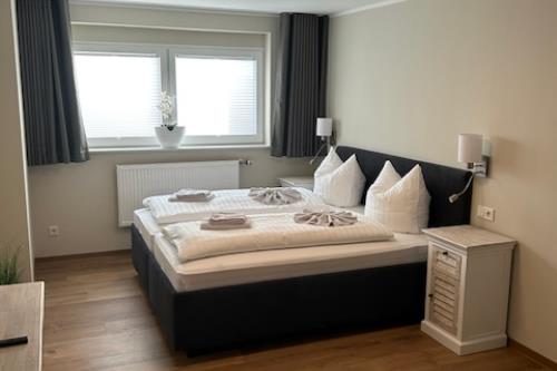 Borkum Ferienwohnungen Haus Passat - Ebbe - Schafzimmer1