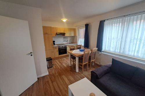 Borkum Ferienwohnung Haus Silbermöwe - Silbermöwe Bungalow - Wohnzimmer