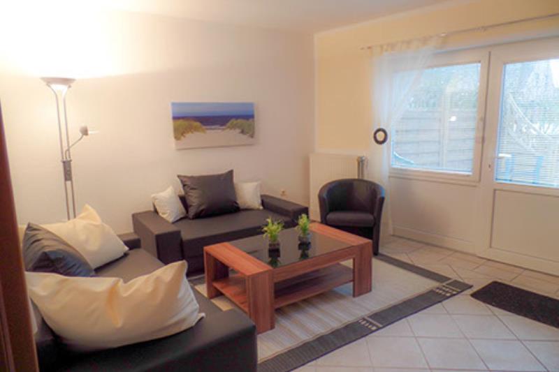 Borkum Haus Strandsonne - Ferienwohnung 4 - Wohnzimmer Sitzbereich