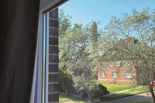 Borkum Ferienwohnung Haus Windröschen - App. 5 - Appartement 5 Blick auf den Leuchtturm