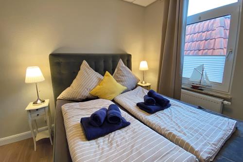Borkum Ferienwohnung Haus Windröschen - App. 7 - Appartement 7 · Schlaf 1 160 x 200 Bett