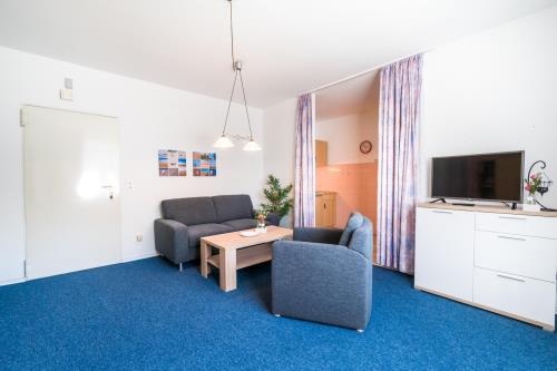Borkum Hotel Garni Haus Bettina - Familienstudio 30m² - Wohnzimmer mit Schrankbett möglich