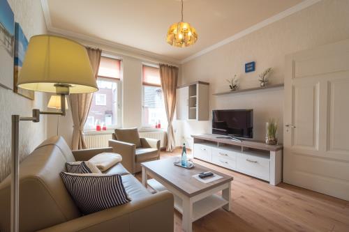 Borkum Ferienwohnung Hotel Windrose Ferienappartements - Austernfischer - Wohnzimmer
