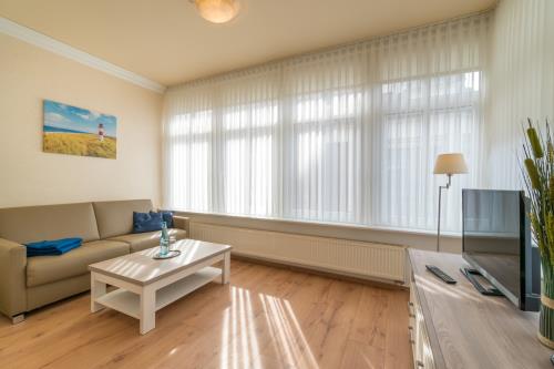 Borkum Ferienwohnung Hotel Windrose Ferienappartements - Krabbenfischer - Wohnzimmer