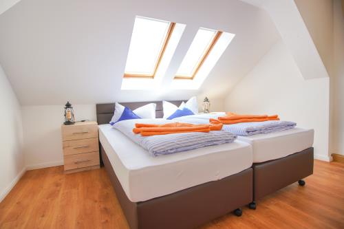 Borkum Ferienwohnung Hotel Windrose Ferienappartements - Seehund - Berg Hotel Windrose Seehund Schlafzimmer