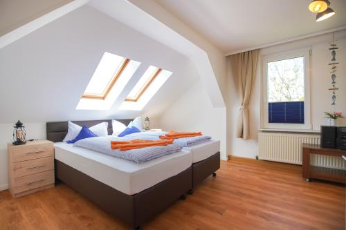 Borkum Ferienwohnung Hotel Windrose Ferienappartements - Seehund - Berg Hotel Windrose Seehund Schlafzimmer